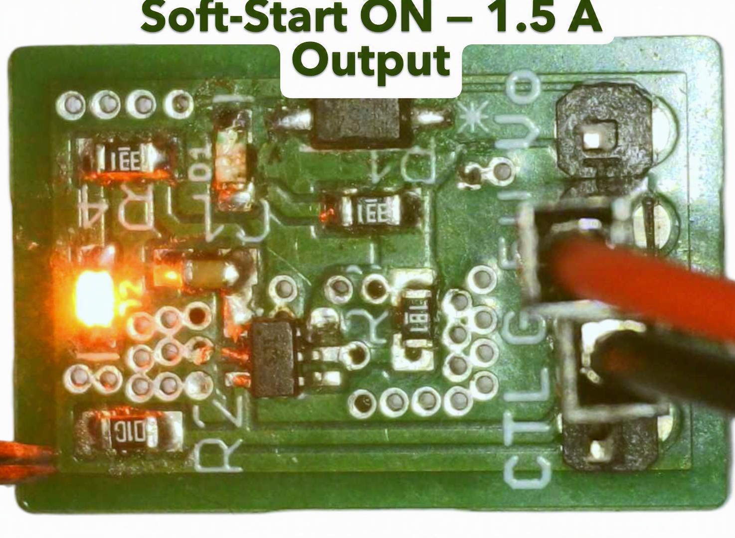 PureSwitch-22919 powered on with input and output status LEDs lit, demonstrating the TI TPS22919 soft-start load switch delivering up to 1.5 A output